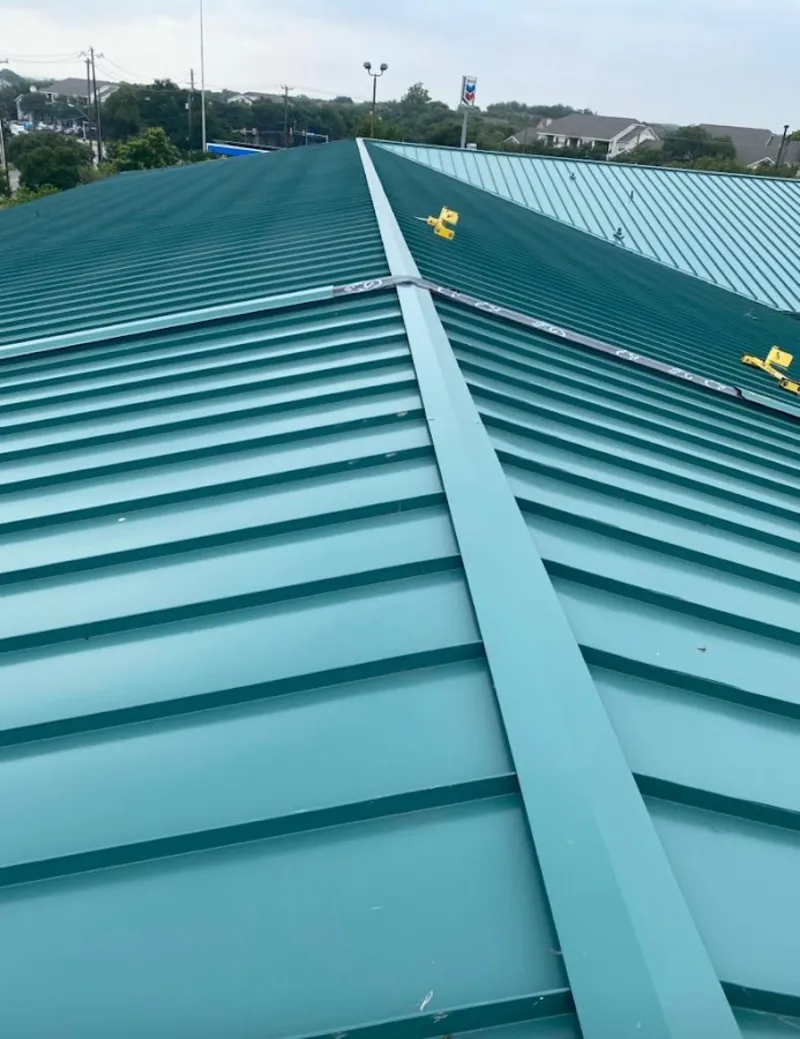 Green commercial metal roof ridge and valley for Metal Roof Repair in Pine Castle